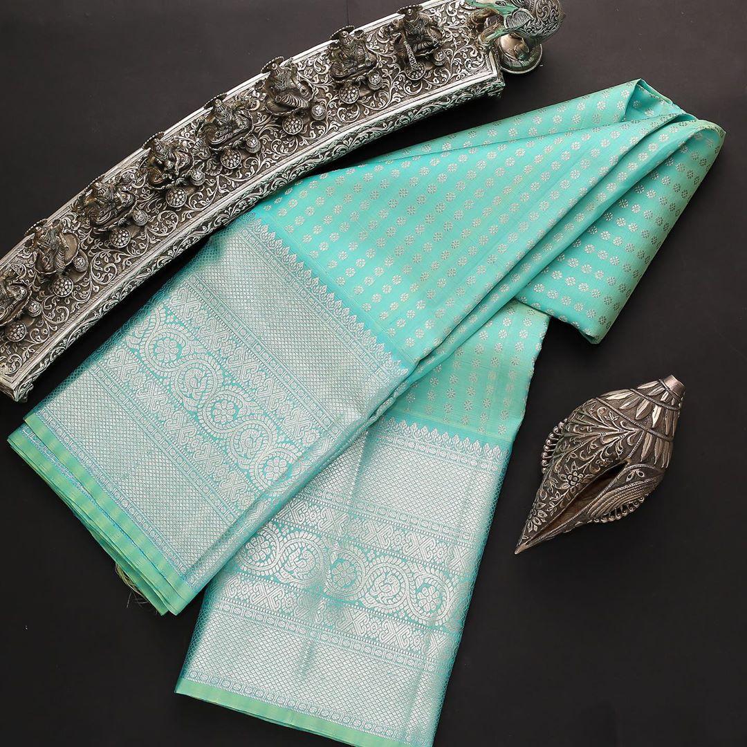Divine Firozi Soft Silk Saree With Dalliance Blouse Piece